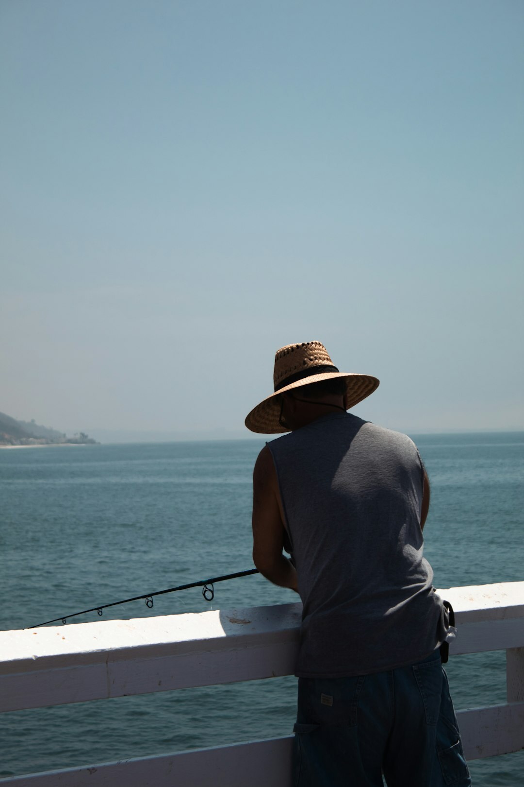 fisherman looking at sea