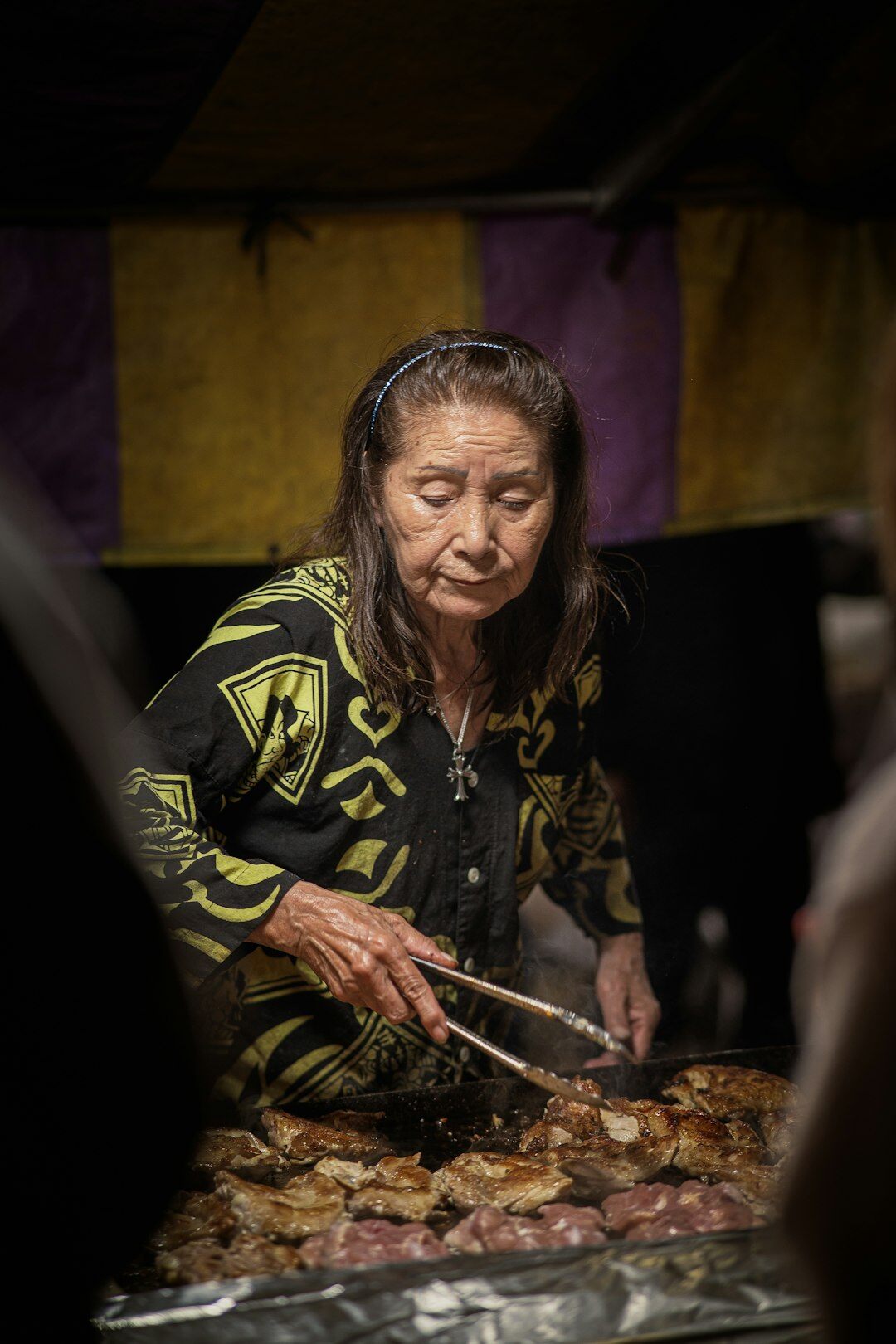 woman cooking traditional food