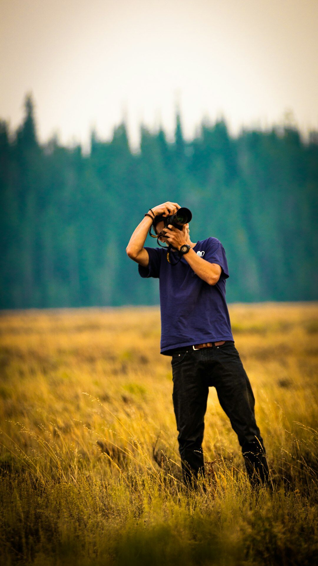 documentary photographer in field