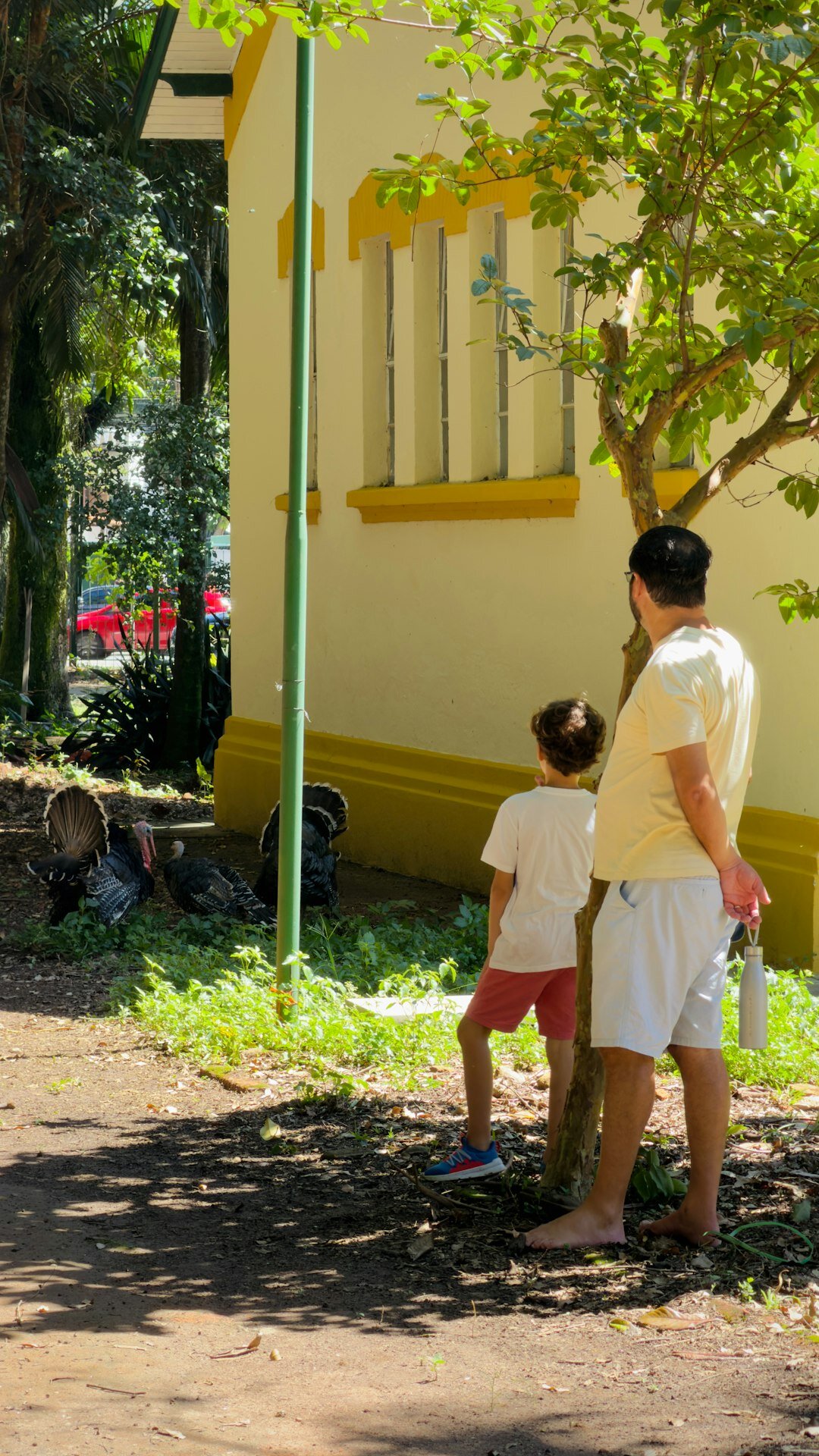 man gardening with children